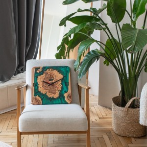 Wall clock «Quantum». Rock elm, green pearl epoxy resin, polyurethane 