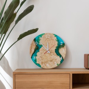 Wall clock «Continuum». Maple, blue transparent epoxy resin, polyurethane, round shape