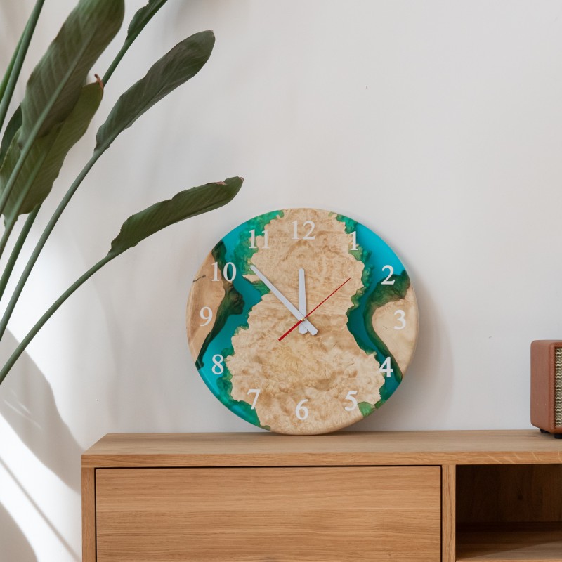 Wall clock «Continuum». Maple, turquoise transparent epoxy resin, polyurethane, round shape