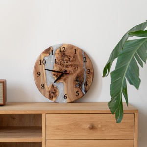Wall clock «Continuum». Walnut, white pearl epoxy resin, polyurethane, round shape