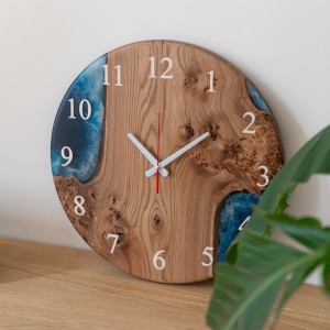 Wall clock «Atlantis». Rock elm, blue opaque epoxy resin, polyurethane varnish