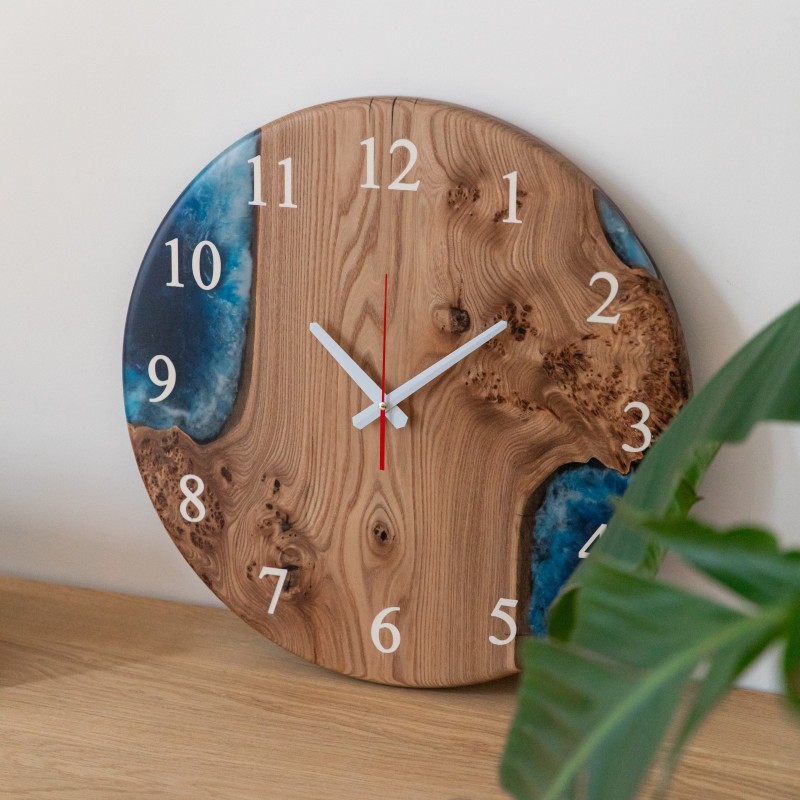 Wall clock «Atlantis». Rock elm, blue opaque epoxy resin, polyurethane varnish