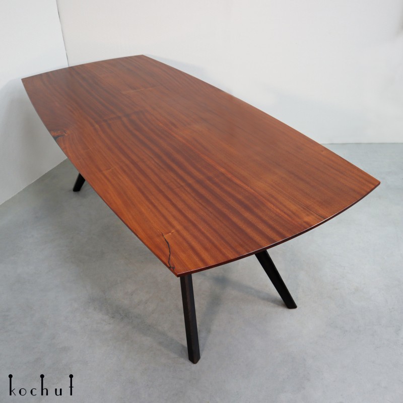 Carbonado is an elm dining table. Embedded in opaque black epoxy resin. Coated with polyurethane varnish.